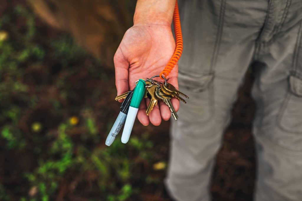Chimp Haven caregiver shows off the keys they carry as they care for the chimps